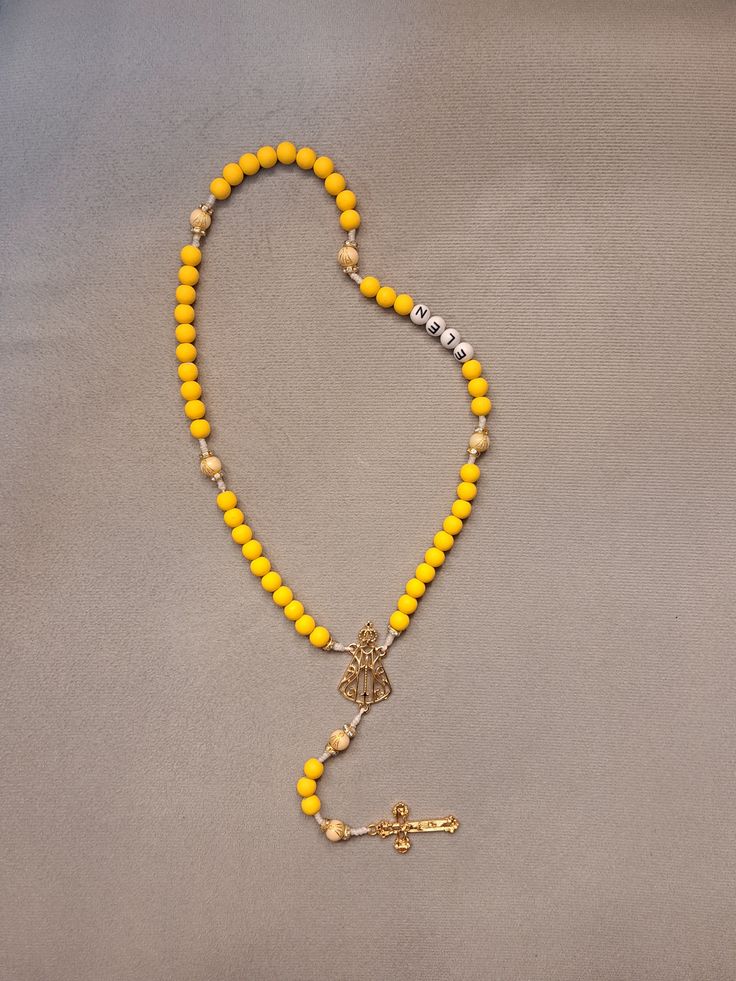 Terço amarelo  thumbnail