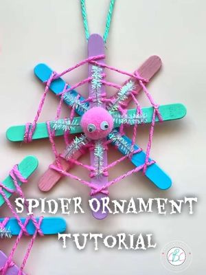 Sweet meets spooky with this pastel spider web ornament DIY! 💕🕸️✨ Using just popsicle sticks and yarn, you can make the