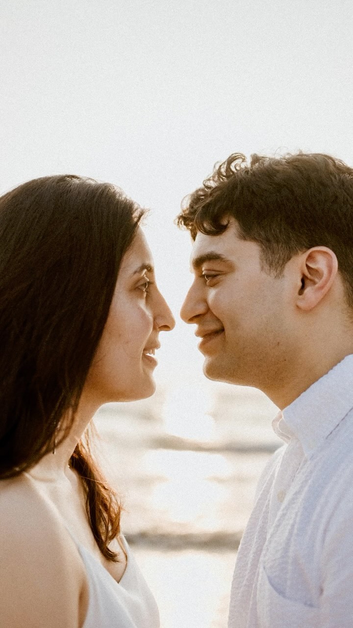 Capturing the essence of love, Krittika & Jai’s romance dances across the shore, painted by the golden hues of the setti