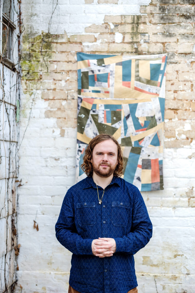 the gatherer: aaron sanders head in garden and gun. thumbnail