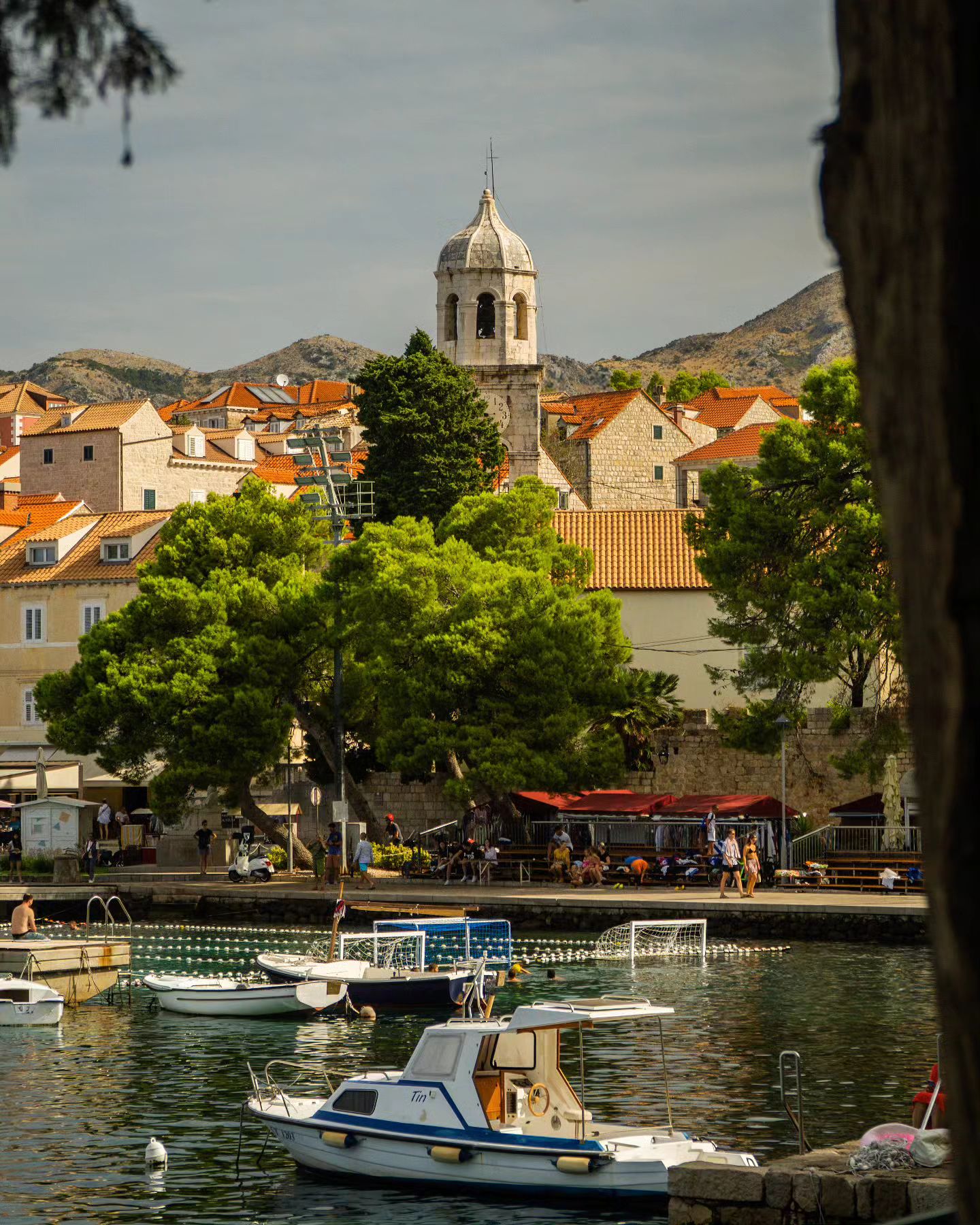 🏞🩵

A corner of tranquility between sea and history.

The boats sway peacefully in the port, while in the background the