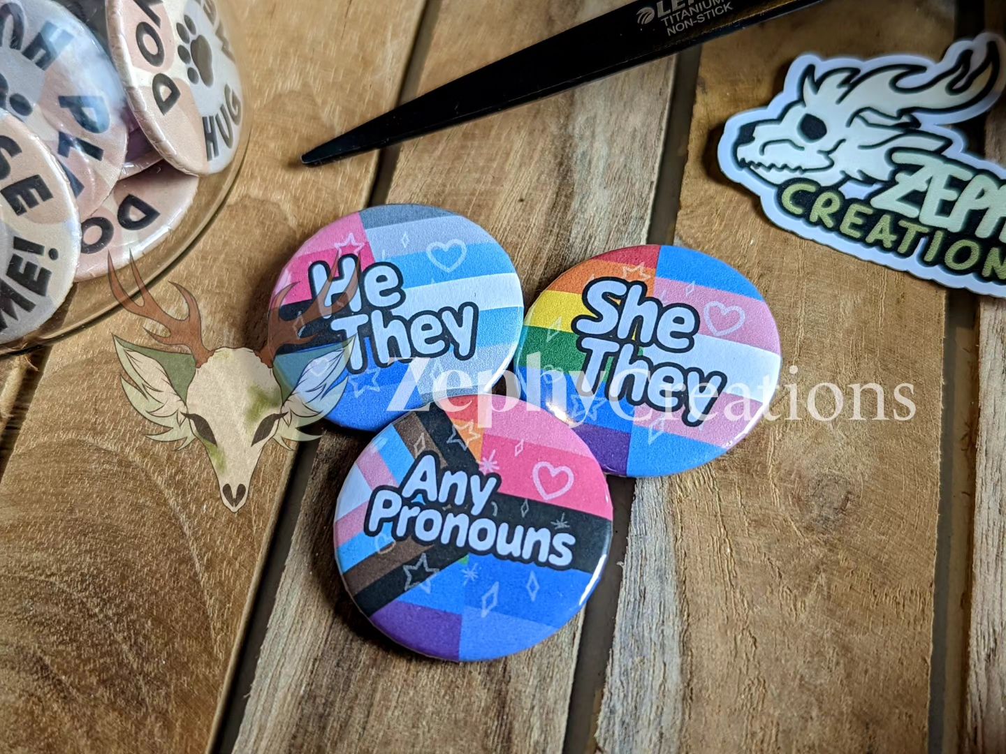 Personalized 38mm pronoun buttons!

Available with any pronouns you want, with one or two flags as background. You can a