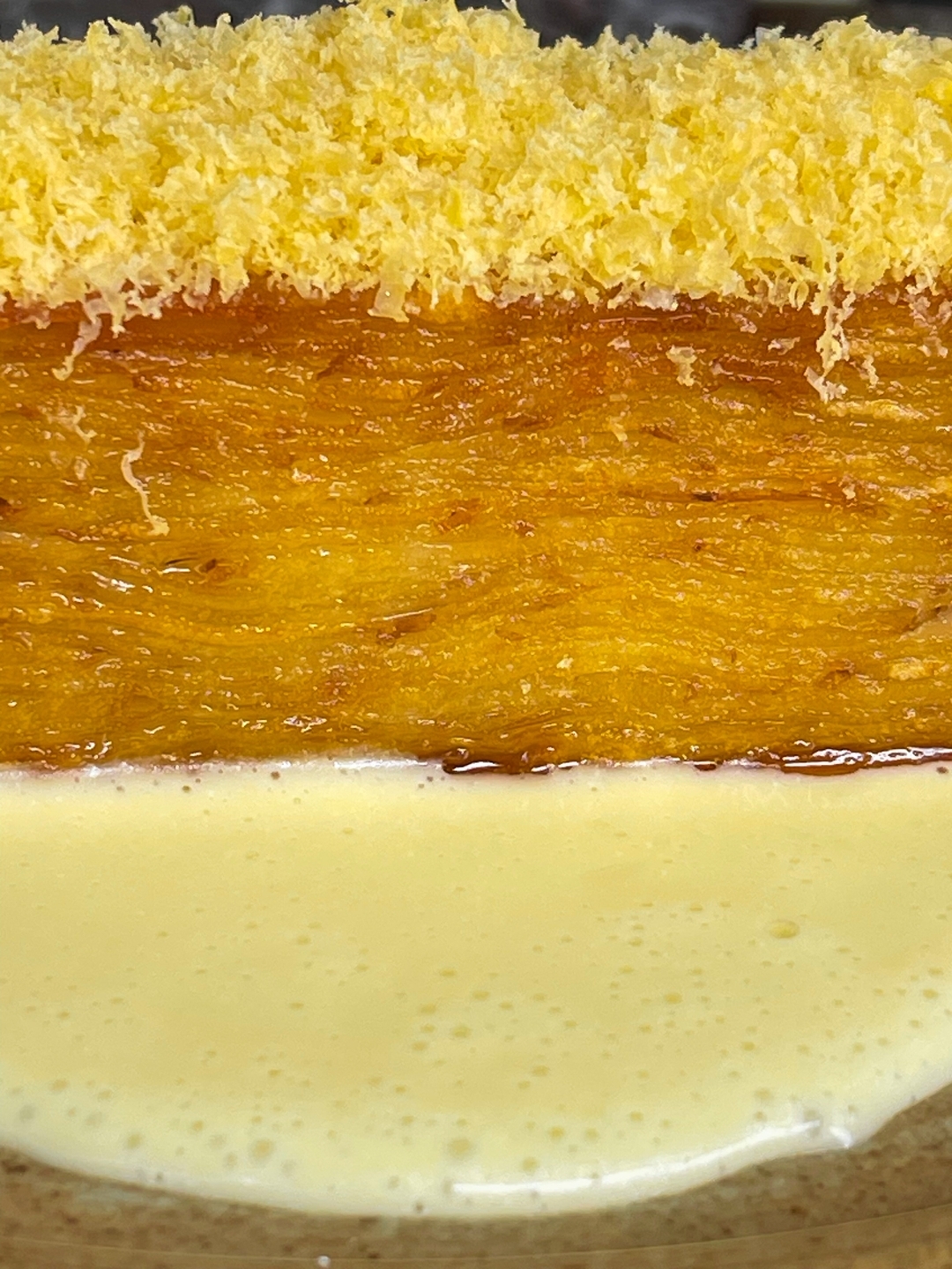 Your favourite Jane dish. Crispy layers of buttery potato goodness topped with finely grated cured yolk on a bed of crea