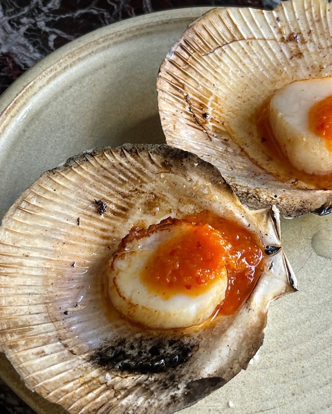 Sweet and buttery smooth grilled scallops with a tart grapefruit and finger lime kosho.

Our native finger lime comes fr