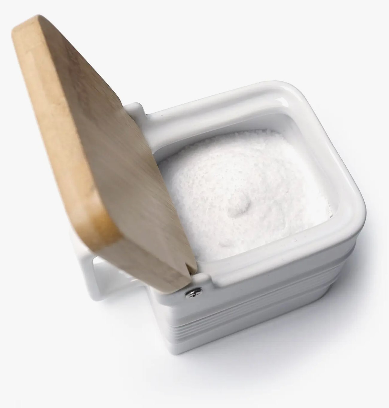 Crafted from high-quality stoneware, this durable and long-lasting salt box is designed to keep your salt fresh and dry 
