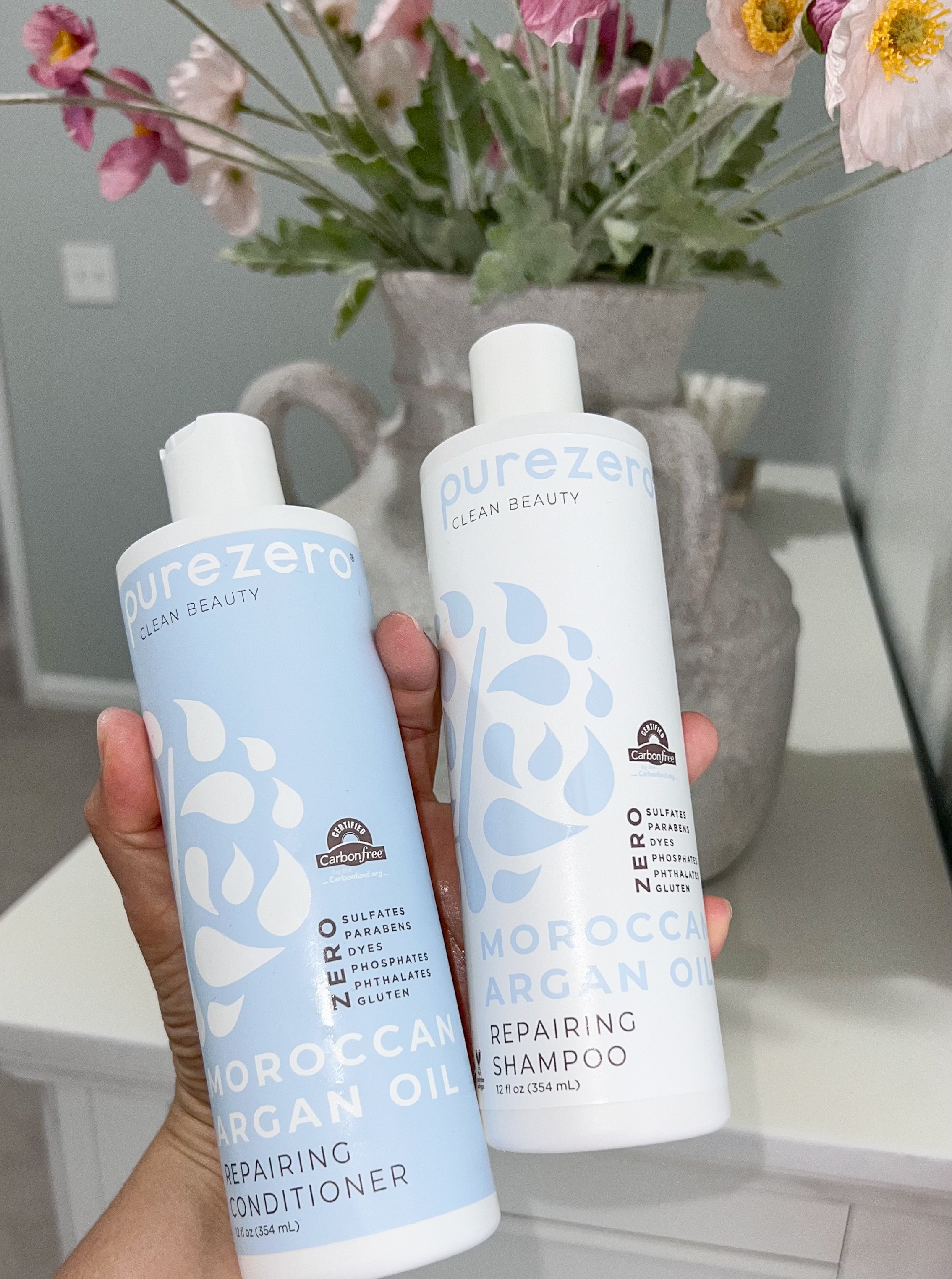 Purezero Juego de champú y acondicionador de aceite de argán marroquí – Repara el cabello dañado – Lucha contra la caspa y el encrespamiento – Cero sulfatos, parabenos, tintes, gluten – 100% vegano y thumbnail