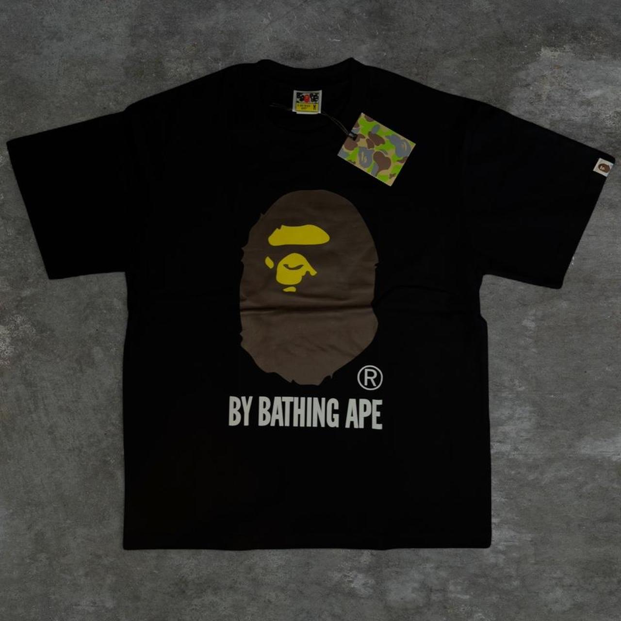 Bape black tee
design on front and logo on left... | Depop thumbnail
