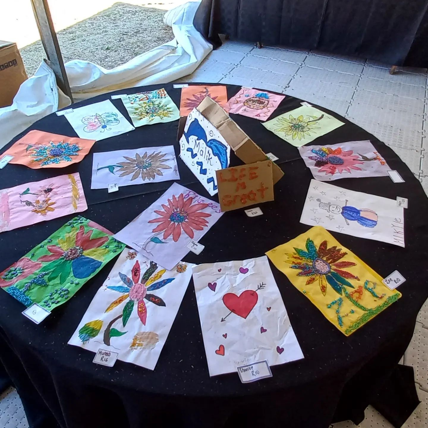 This was the end results of the arts and craft. All the kids got to sell their own paintings and set their own prices fo