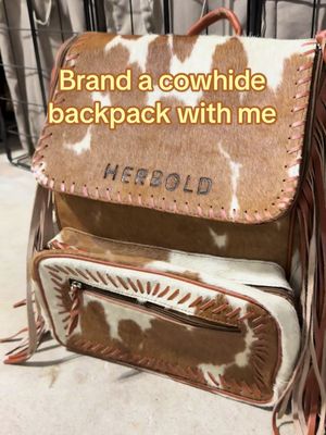 Brand our last fringed out cowhide backpack with me!m🤎 #cowhidebackpack #cowhide #westernbackpack #branding 