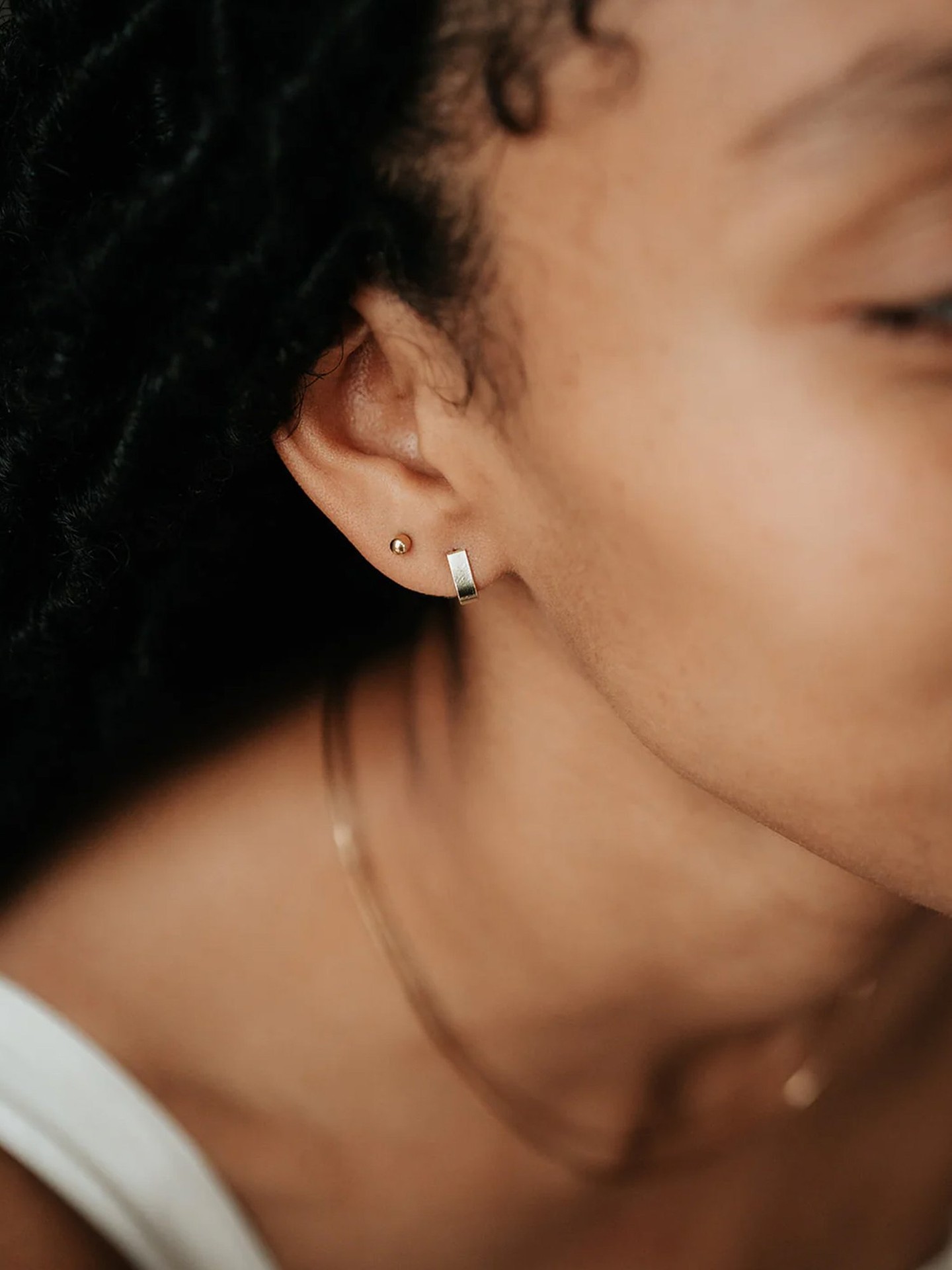 These simple and modern everyday studs were handmade by Rebekah Vinyard Jewelry! The curvature allows the earrings to wr