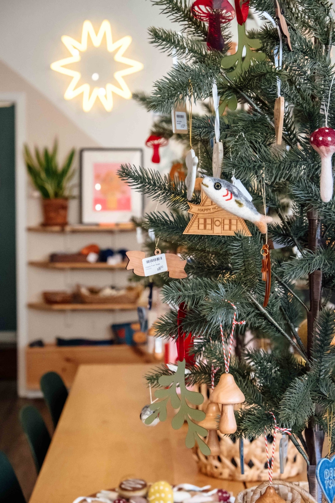 Our Christmas trees are full of the cutest selection of handmade and small-batch designed ornaments!