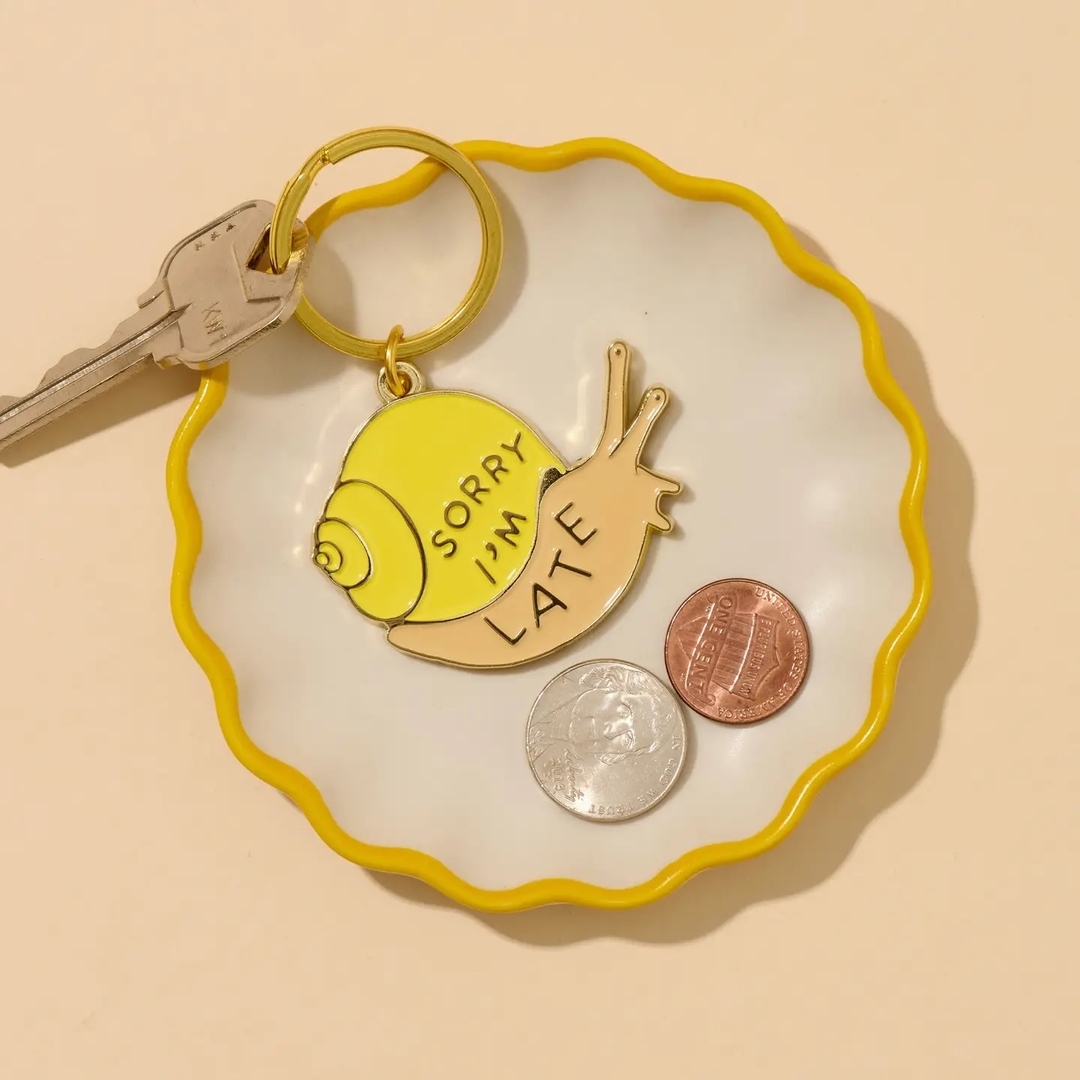 Add some humor to your keychain with these adorable new designs by And Here We Are!