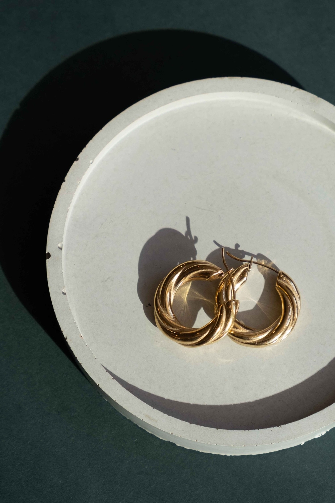 The Kailee Earrings - A fun twist (pun intended) on the classic everyday hoops.