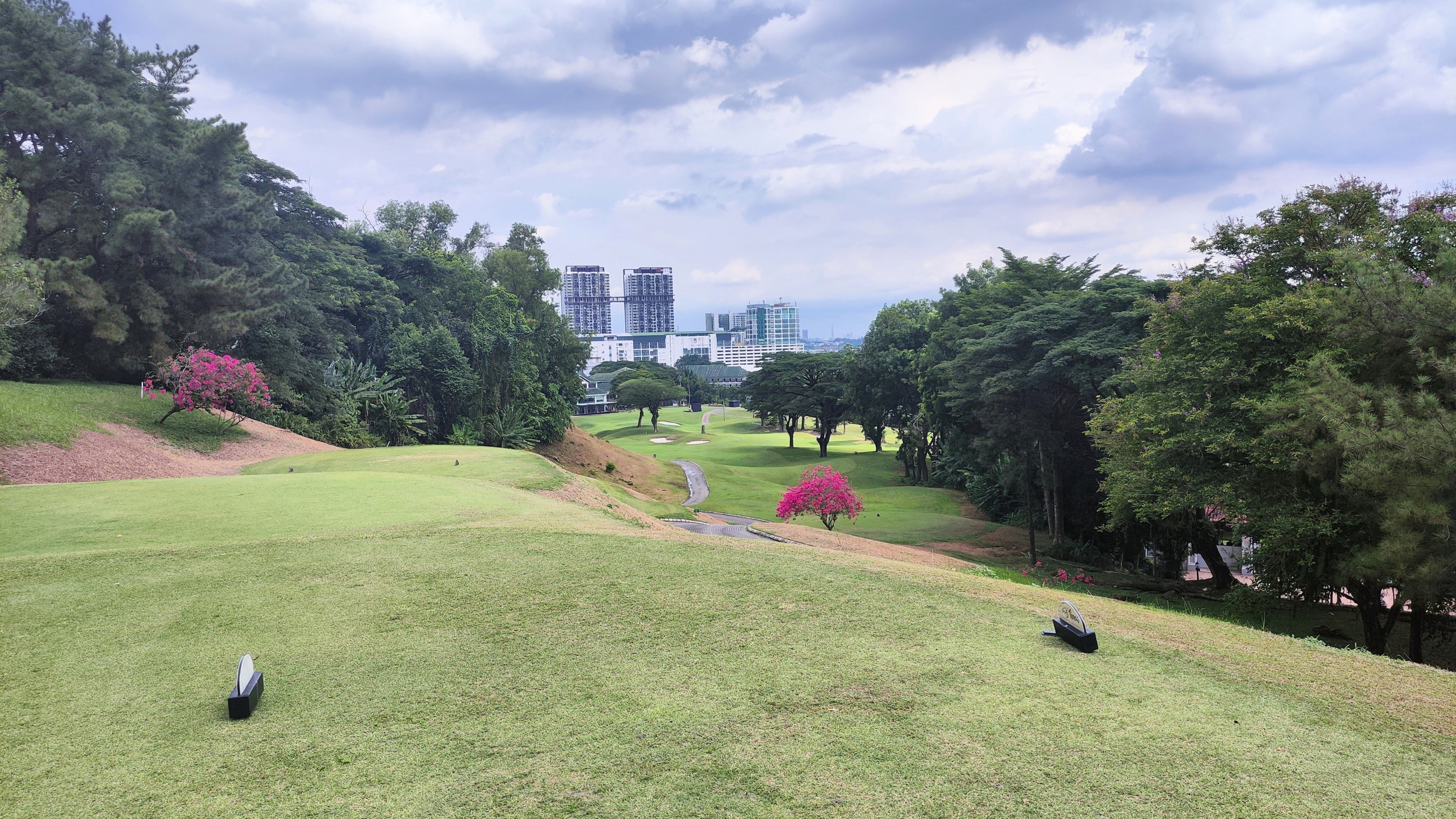 Hole 18 Par 4 at The Mines Golf: A Grand Finale Framed by Skyline and Strategy thumbnail