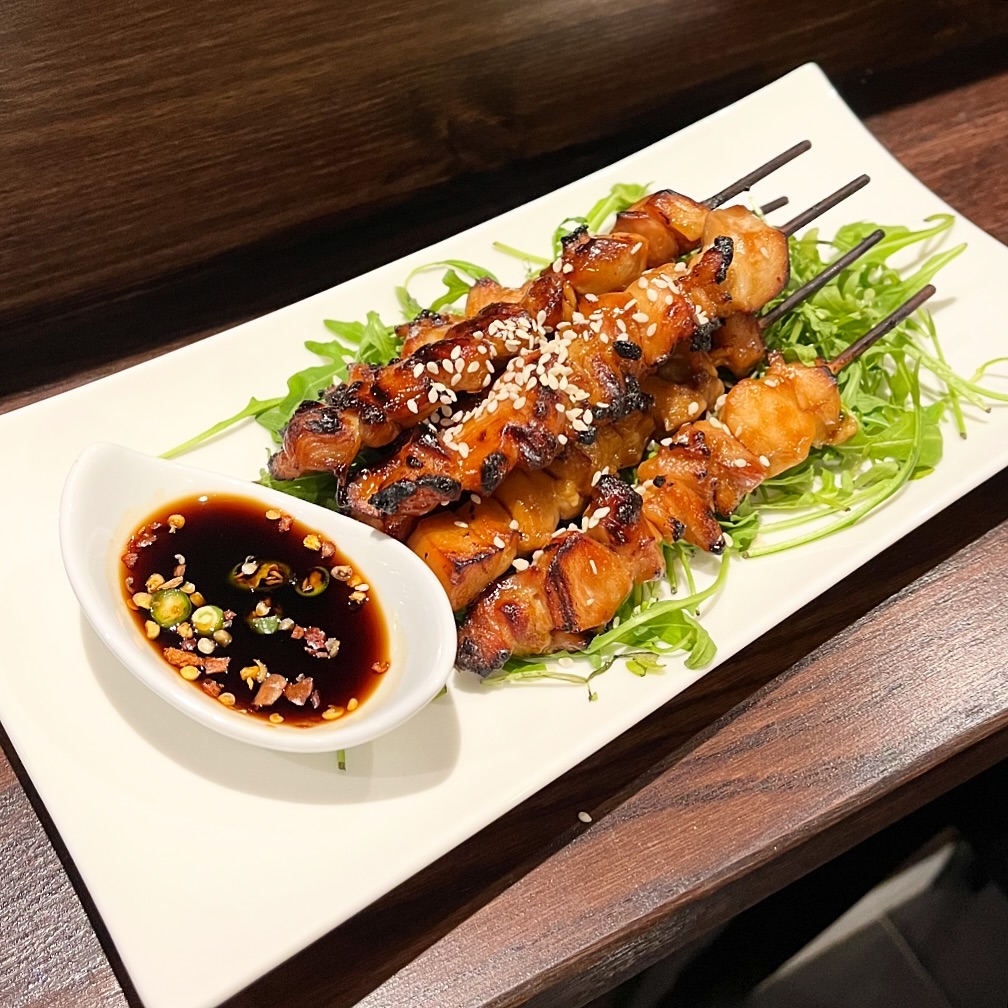 Our yakitoris consist of bite sized pieces of chicken in bamboo skewers, marinated in chili or teriyaki with a side of s