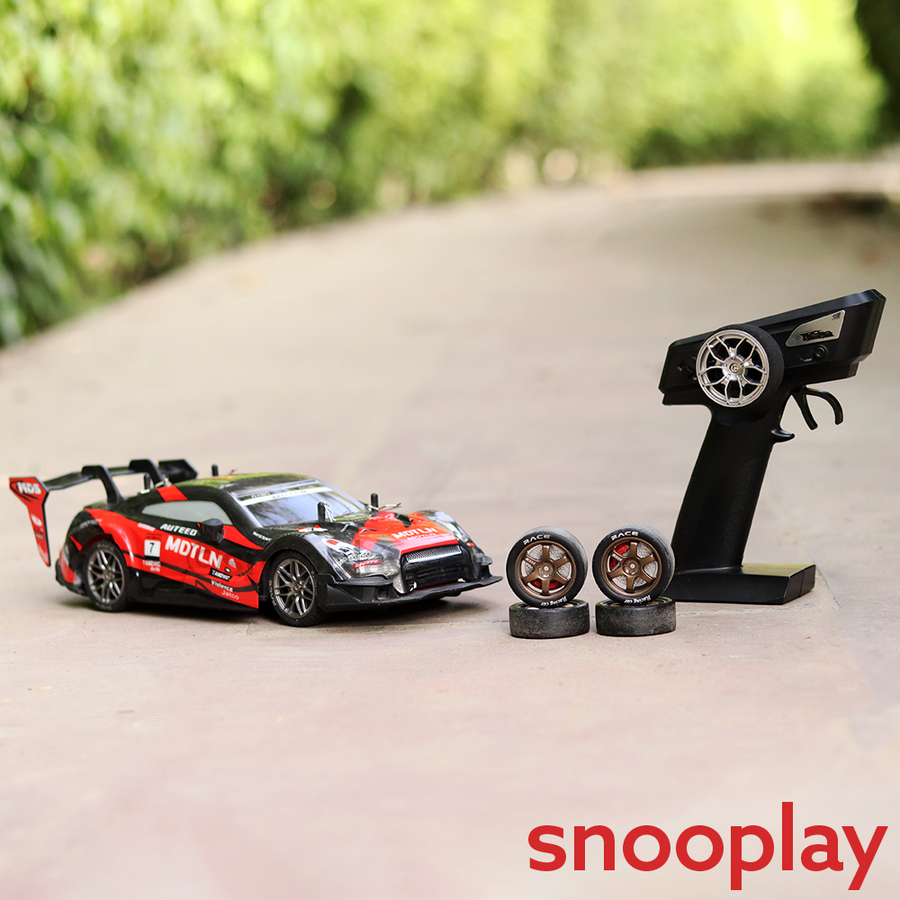 Remote Control 4x4 Drift Racing Car with 4 Spare Wheels - 2.4GHz Frequency, Light & Sound | 1:16 Scale (5-12 Years) thumbnail