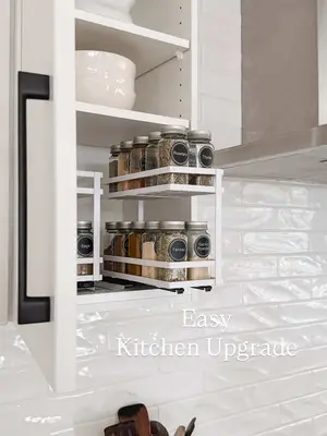 Easy Kitchen Upgrade. Linked in my Amazon Shop under KITCHEN. This adhesive pull-out spice rack turns a regular cabinet 