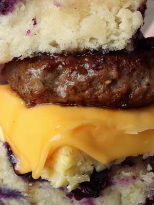 Blueberry Butter Swim Biscuit Breakfast Sandwiches with Fluffy Egg Squares, Maple Breakfast Sausage, and American Cheese