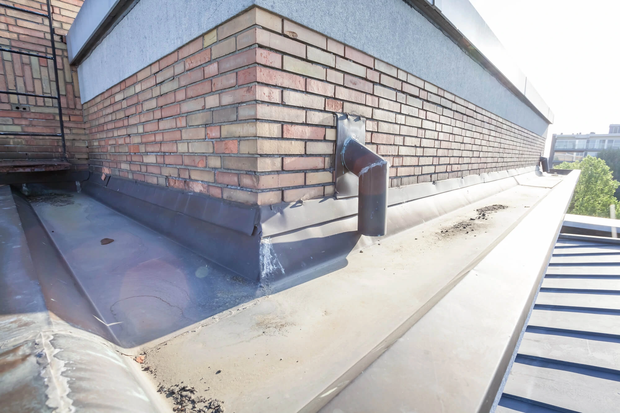 How Improper Drainage Accelerates Commercial Roof Deterioration thumbnail